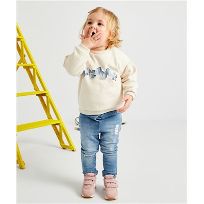 JEAN BÉBÉ FILLE EN DENIM LOW IMPACT AVEC PATCHS EN TISSU