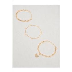 Стильный комплект браслетов-цепочек с золотыми цветочными фигурками