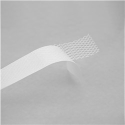 Сеточка-паутинка клеевая на бумажной основе 20 мм