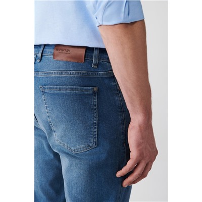 Синие джинсовые брюки берлинского винтажного потертого гибкого приталенного кроя