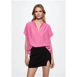 Blusa fluida botones -  Mujer | MANGO OUTLET España