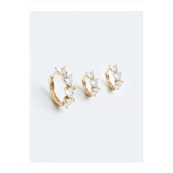 Стильные серьги-кольца с золотыми камнями
