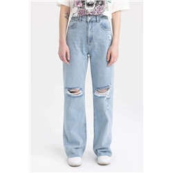 Длинные джинсовые брюки с широкими штанинами и рваными деталями в стиле 90-х годов