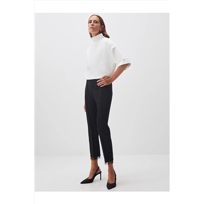 Черные узкие брюки с высокой талией и детальной отделкой