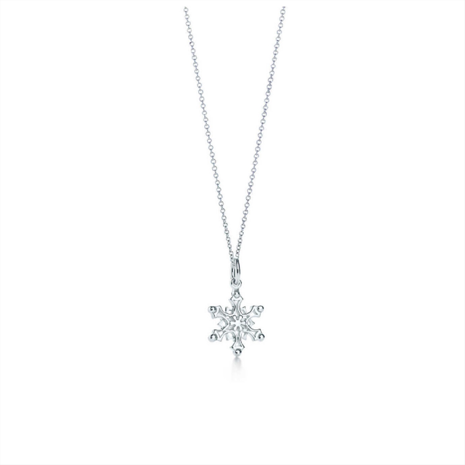 Подвеска снежинка золото. Tiffany Snowflake. Серьги снежинки на цепочке. Тиффани украшения Снежинка. Кулон в виде снежинки с бриллиантами.