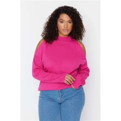 Розовый вязаный свитер с вырезами